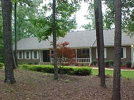 4 bed, 3 bath home on river with acrage in Fairburn, GA