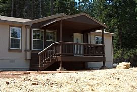 MOVE IN READY, ACREAGE, GARAGE, AND MORE in Grizzly Flats, CA