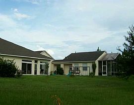 lakefront home on 5 acres 4/3 and 3 car in Groveland, FL (Photo 2 of 6)