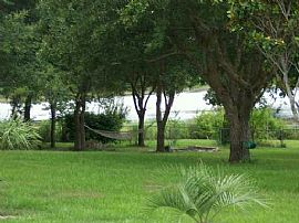 lakefront home on 5 acres 4/3 and 3 car in Groveland, FL (Photo 3 of 6)