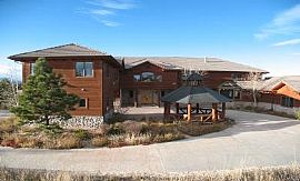 THE ULTIMATE EXECUTIVE HOME, WITH STABLE in Indian Hills, CO