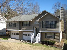 4 bdrm / 3 bth Split foyer GREAT SCHOOLS in Sugar Hill, GA