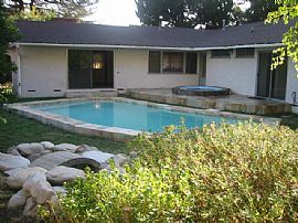 Ranch home fireplace, pool, jacuzzi,yard in Lake View Terrace, CA (Photo 4 of 4)