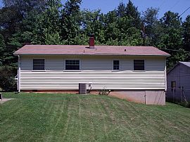 One story home on acre  in Asheville, NC (Photo 2 of 6)