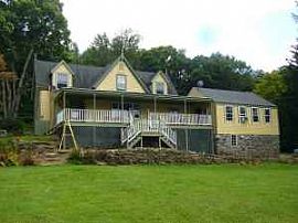 Beatiful home overlooking secluded pond in Warren, CT (Photo 1 of 3)