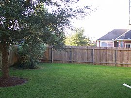 Promenade Subdivision Two Story Home in Stafford, TX (Photo 2 of 3)