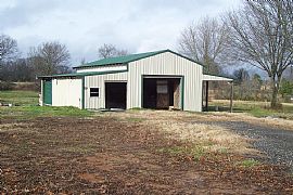Large Farm House on 10.5 Acres in Buena Vista, TN (Photo 3 of 3)