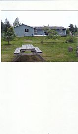 Custom home on 2 acres,3 bd. 2 bth. great for families and pets in Eatonville, WA (Photo 2 of 4)