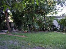 Beautiful Design District Home for Rent 3/2 w/ Lush Landscaping in Miami, FL (Photo 2 of 6)