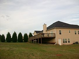Newer 4 BR, 3 BA House On 1.5+ Acres With full basement in Social Circle, GA (Photo 2 of 6)