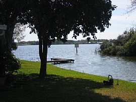 Beautiful 4 BR, 2 .5 BA Lake House For Rent, Available Now in Tampa, FL (Photo 2 of 5)