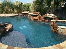 Upscale 4 BR, 2.5 BA Home With Pool And Hardwood Floors in Little Elm, TX (Photo 2 of 3)