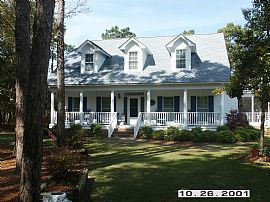 Very Nice 4 BR, 2 BA Home  With Enclosed Porch In Arboretum in Caswell Beach, NC