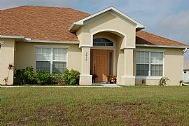 Beautiful 4 BR, 2 BA Alarm Service With Rent In NW Cape Coral in Cape Coral, FL