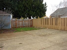 Quaint 2 Bedroom with Brick Patio Backyard that has RV Port in Vancouver, WA (Photo 6 of 12)