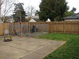 Quaint 2 Bedroom with Brick Patio Backyard that has RV Port in Vancouver, WA (Photo 8 of 12)
