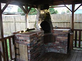 Quaint 2 Bedroom with Brick Patio Backyard that has RV Port in Vancouver, WA (Photo 9 of 12)