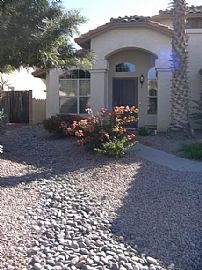 Beautiful 4 Bedroom 2 bath Home: features an Upgraded Backyard in Chandler, AZ (Photo 2 of 6)