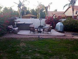 Beautiful 4 Bedroom 2 bath Home: features an Upgraded Backyard in Chandler, AZ