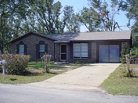 Quiet 3 Bedroom Brick Home with Ceiling Fans in Every Room in Pace, FL (Photo 3 of 12)