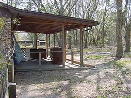 Quiet 3 Bedroom Brick Home with Ceiling Fans in Every Room in Pace, FL (Photo 4 of 12)