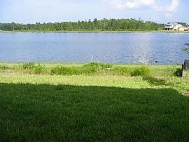 IMMACULATE 4 BR, 2 BA, 2 CAR Lakefront Home in UPSCALE Community in Alafaya, FL (Photo 3 of 4)