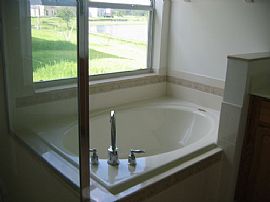 IMMACULATE 4 BR, 2 BA, 2 CAR Lakefront Home in UPSCALE Community in Alafaya, FL (Photo 4 of 4)