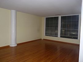 Spacious Printer's Row 1 BR, 1 BA + Den Condo with Elfa Closets in Chicago, IL (Photo 1 of 8)