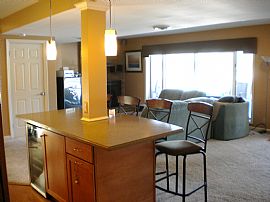 Gorgeous 4 Bedroom Waterfront Home with Wet Bar! in White Lake, MI (Photo 11 of 12)