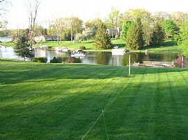 Gorgeous 4 Bedroom Waterfront Home with Wet Bar! in White Lake, MI (Photo 12 of 12)