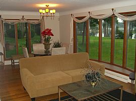 Gorgeous 4 Bedroom Waterfront Home with Wet Bar! in White Lake, MI (Photo 2 of 12)