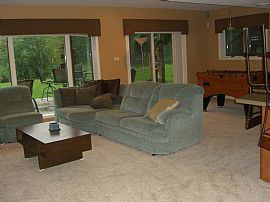 Gorgeous 4 Bedroom Waterfront Home with Wet Bar! in White Lake, MI (Photo 3 of 12)