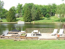 Gorgeous 4 Bedroom Waterfront Home with Wet Bar! in White Lake, MI (Photo 5 of 12)