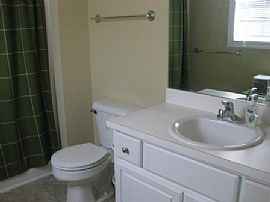 Beautiful 4 BR, 2 BA Home with Newer Construction in Wilson, NC (Photo 9 of 10)