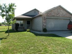 Attractive 3 Bedroom Home with Cathedral Ceiling Living Room in Southport, IN