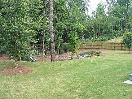 Magnificent 4 Bedroom Home with Large Lake for Fishing  in Cumming, GA (Photo 2 of 5)