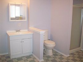 Great 4 Bedroom Home with Fenced Yard and New Carpet in Chubbuck, ID (Photo 6 of 10)