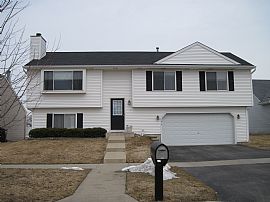 Cozy 2-Story, 3 Bedroom Home with Garage Near Woodstock in Harvard, IL