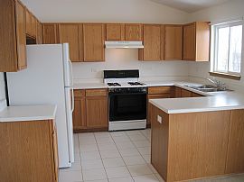 Cozy 2-Story, 3 Bedroom Home with Garage Near Woodstock in Harvard, IL (Photo 2 of 4)