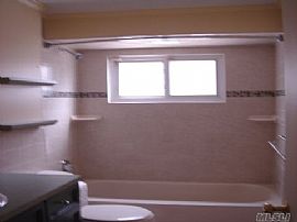 Exquisite 3 Bedroom Ranch Home with In-Ground Pool in Huntington, NY (Photo 7 of 12)