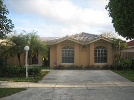 Beautiful 4 Bedroom Home with Covered Patio and Koy Pond in Miami, FL