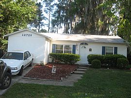 Ideal 3 Bedroom Home with Possible 4th Bedroom with Pool in New Port Richey, FL