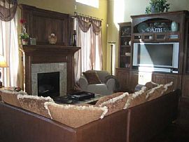 Temporary 4 Bedroom Home with Window Treatment, and Stained Wood in Edmond, OK (Photo 3 of 4)