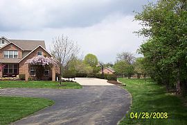 Spacious 4 Bedroom Home on 2.5 Acres with Stocked Pond in Liberty Township, OH (Photo 2 of 10)