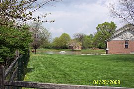 Spacious 4 Bedroom Home on 2.5 Acres with Stocked Pond in Liberty Township, OH (Photo 3 of 10)