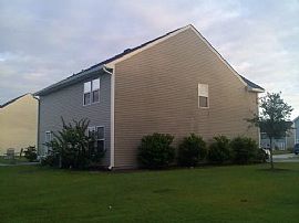 Spacious 4 Bedroom with 2 Car Garage and Nice Yard in Rincon, GA