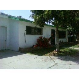 Cozy 2 Bedroom Home with 2 Car Garage and Private Backyard in Cudahy, CA
