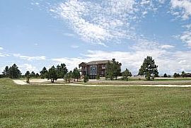 Stunning 3 Level, 4 Bedroom Stucco Home with 6488 Sq. Ft. in Monument, CO