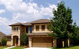 Custom 4 Bedroom with Equipped Media Room in Heath, TX