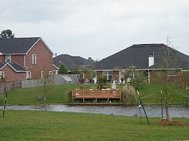 Great 4 Bedroom Home in Windrose Subdivision with Water View in Gulfport, MS (Photo 9 of 10)